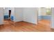 Open living room with hardwood floors and ample natural light at 604 Eden Ln, Chapel Hill, NC 27517