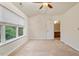 Bright bedroom with ample natural light and a view of the outdoors at 615 Carlton Commons Ln, Cary, NC 27519