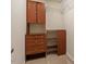 Walk-in closet with a storage unit with drawers, shelves and closet rod at 615 Carlton Commons Ln, Cary, NC 27519