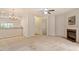 Expansive living room featuring elegant chandelier, fireplace, and ample space for entertaining at 615 Carlton Commons Ln, Cary, NC 27519