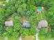 Aerial view of the property with a pool in the neighborhood, highlighting the private lot at 618 Durwood Dr, Raleigh, NC 27603