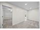 Neutral bedroom offering great space, plush carpet, and a ceiling fan at 618 Durwood Dr, Raleigh, NC 27603
