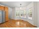 Sunlit breakfast nook with oak cabinets and plenty of natural light at 618 Durwood Dr, Raleigh, NC 27603
