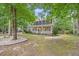 Charming two-story home featuring a welcoming front porch and well-maintained landscaping at 618 Durwood Dr, Raleigh, NC 27603