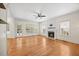 Spacious living room with hardwood floors, fireplace, and ample natural light at 618 Durwood Dr, Raleigh, NC 27603