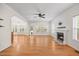 Bright living room features hardwood floors, fireplace, and lots of natural light at 618 Durwood Dr, Raleigh, NC 27603