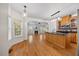 Open-concept kitchen and living room features hardwood floors and granite countertops at 618 Durwood Dr, Raleigh, NC 27603