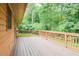 Spacious wooden deck overlooking private, wooded backyard at 7030 Stockard Rd, Snow Camp, NC 27349