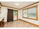 Bright dining area features a sliding glass door and ample natural light from the large window at 7030 Stockard Rd, Snow Camp, NC 27349