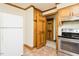 Functional kitchen with modern appliances, wooden cabinets and convenient access to the dining area at 7030 Stockard Rd, Snow Camp, NC 27349