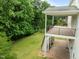 Backyard deck that offers great space, perfect for entertaining guests with an entrance to a large lawn at 7409 Chesley Ln, Durham, NC 27713