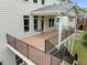This spacious deck has metal railings and room for entertaining or just enjoying the outdoors at 7409 Chesley Ln, Durham, NC 27713