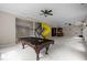 Basement game room with pool table, tube slide, recessed lighting and attached bar area at 7409 Chesley Ln, Durham, NC 27713