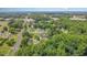 Beautiful aerial view of a residential neighborhood surrounded by lush greenery and easy access to local street at 104 Goldleaf Ct, Angier, NC 27501