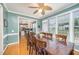 Open dining room with hardwood floors and access to the kitchen at 104 Goldleaf Ct, Angier, NC 27501