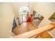 View of the foyer with hardwood floors, chandelier, staircase, and front door at 104 Goldleaf Ct, Angier, NC 27501