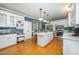 Spacious kitchen with an island, stainless steel appliances, and ample storage at 104 Goldleaf Ct, Angier, NC 27501