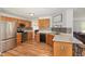 Kitchen with stainless steel appliances, tile backsplash and wooden cabinets at 105 Rolling Stone Ct, Sanford, NC 27332