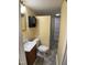 Modest bathroom with vanity, toilet, medicine cabinet, and shower stall at 108 Herbert St, Durham, NC 27703