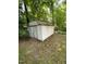 Exterior view of shed in backyard surrounded by mature trees at 108 Herbert St, Durham, NC 27703