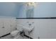 Charming bathroom with classic black and white tile and retro fixtures at 1110 Edgewood Ave, Burlington, NC 27215