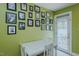Breakfast nook with white table and chairs next to door to the backyard at 1110 Edgewood Ave, Burlington, NC 27215