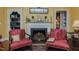 Stylish fireplace with a white mantle and classic decor at 1110 Edgewood Ave, Burlington, NC 27215
