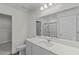 Bathroom featuring a white vanity, large mirror and a shower and bath combination with lots of light at 1214 Pond Overlook Drive, Nashville, NC 27856