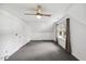 Large bonus room featuring a ceiling fan, neutral carpet, and bright natural light at 1218 Chimney Hill Dr, Apex, NC 27502