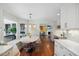 Bright breakfast nook with bay window and stylish modern lighting fixture at 1218 Chimney Hill Dr, Apex, NC 27502