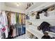 Spacious walk-in closet with custom shelving units and clothing rods offering optimal storage at 1218 Chimney Hill Dr, Apex, NC 27502
