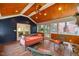 Screened porch with tile floors, wood ceiling, and comfortable seating at 1218 Chimney Hill Dr, Apex, NC 27502