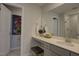 Bright bathroom features a large mirror, modern vanity, and a separate water closet at 1227 Bessie Ct, Wake Forest, NC 27587