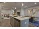 Open kitchen featuring stainless steel appliances, an island sink, and modern cabinetry at 1227 Bessie Ct, Wake Forest, NC 27587