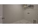 The laundry room with tile floors and washer-dryer hookups provides functionality and convenience at 1227 Bessie Ct, Wake Forest, NC 27587
