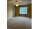 Bedroom featuring neutral carpet, natural light, and a ceiling fan at 126 Riverglade Dr, Clayton, NC 27527