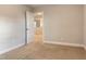 Bedroom with neutral carpet and a hallway view at 13 Knotty Pine Lane, Clayton, NC 27520