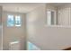 Upstairs hallway with trim and multiple windows allowing natural light at 13 Knotty Pine Lane, Clayton, NC 27520