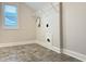 Laundry room with vinyl flooring, window and hookups at 13 Knotty Pine Lane, Clayton, NC 27520