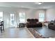 Open living area boasts neutral walls and lots of natural light at 13 Knotty Pine Lane, Clayton, NC 27520