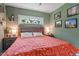 Charming bedroom with a queen-sized bed, neutral walls, and bright natural lighting at 1314 S East St, Raleigh, NC 27601
