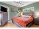 Cozy bedroom with natural light, stylish furniture, and a serene ambiance at 1314 S East St, Raleigh, NC 27601
