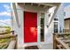 Modern front door with a red finish and a sleek, minimalist design at 1314 S East St, Raleigh, NC 27601