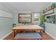 Bright dining room featuring natural light, a wooden table, and decorative wall art at 1355 Sykes Rd, Spring Hope, NC 27882