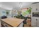 Bright kitchen with an island, pendant lighting, and views to an exterior window at 1355 Sykes Rd, Spring Hope, NC 27882