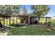 Functional outbuilding providing a relaxing outdoor space with a porch, seating, and exercise area at 1355 Sykes Rd, Spring Hope, NC 27882