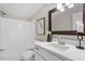 Clean bathroom with tub, modern fixtures, and updated vanity at 141 S Creek Dr, Louisburg, NC 27549
