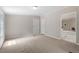 Spacious bedroom leading to a primary bathroom with a soaking tub at 141 S Creek Dr, Louisburg, NC 27549