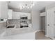 Well-lit kitchen features stainless steel appliances, sleek countertops, and ample cabinet space at 1941 White Memorial Church Rd, Willow Springs, NC 27592