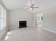 Spacious living room features a fireplace, vaulted ceilings, and hardwood floors at 1941 White Memorial Church Rd, Willow Springs, NC 27592